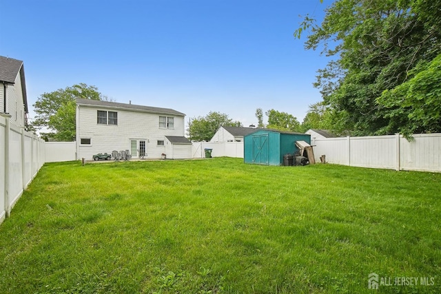 view of yard with a storage unit and an outdoor structure