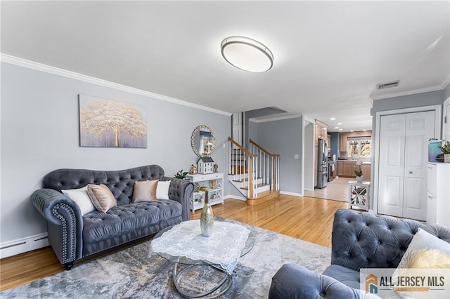 living area with visible vents, light wood-style flooring, ornamental molding, stairway, and baseboards