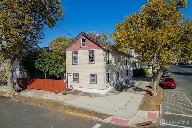 view of front of house with fence