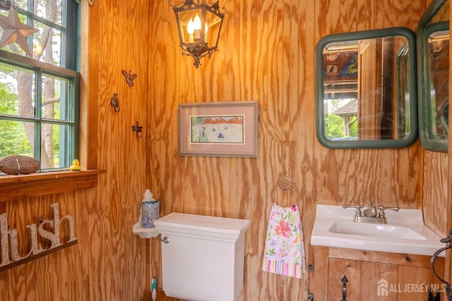 7 Finch Ct, West Windsor, NJ 08550 - half bathroom with a sink and wooden walls
