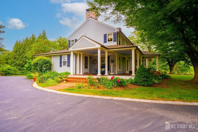 7 Finch Ct, West Windsor, NJ 08550 - farmhouse inspired home featuring covered porch and a chimney