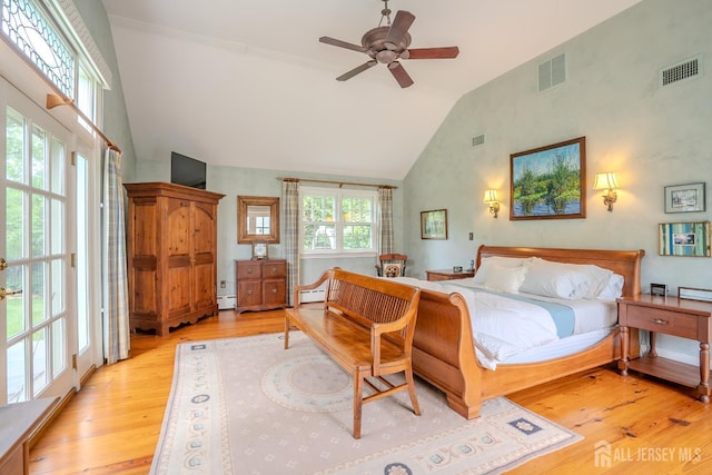 7 Finch Ct, West Windsor, NJ 08550 - bedroom featuring high vaulted ceiling, light wood-style flooring, and a baseboard radiator