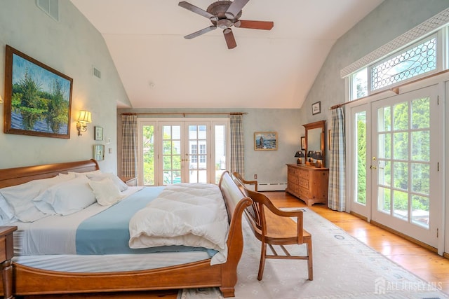 7 Finch Ct, West Windsor, NJ 08550 - bedroom with french doors, high vaulted ceiling, access to outside, light wood-type flooring, and baseboard heating
