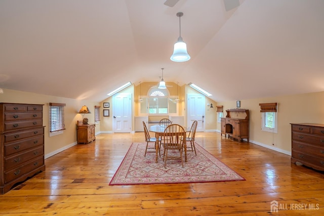 7 Finch Ct, West Windsor, NJ 08550 - dining area with vaulted ceiling and light wood-style flooring