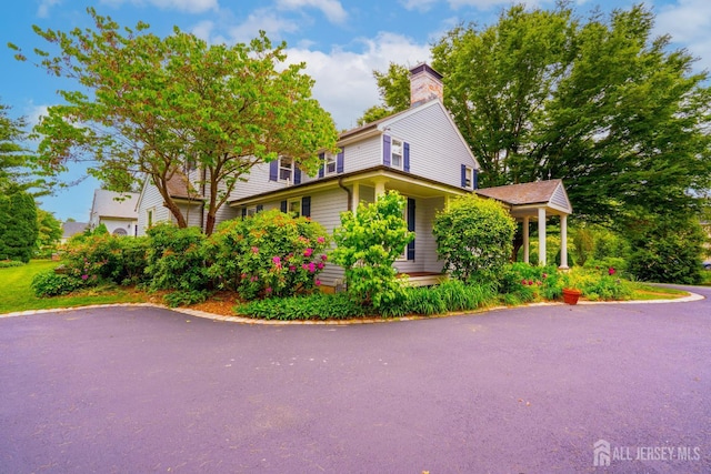 7 Finch Ct, West Windsor, NJ 08550 - view of front of home featuring a chimney