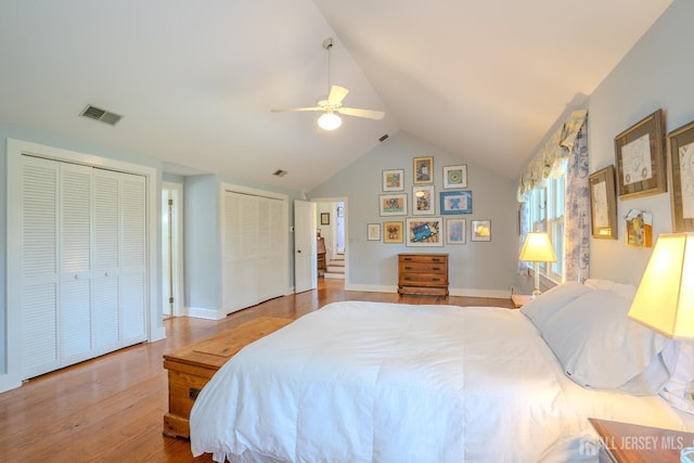 7 Finch Ct, West Windsor, NJ 08550 - bedroom with multiple closets, lofted ceiling, wood finished floors, and a ceiling fan