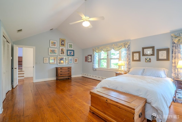 7 Finch Ct, West Windsor, NJ 08550 - bedroom featuring a baseboard radiator, wood finished floors, a ceiling fan, and high vaulted ceiling