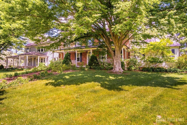 7 Finch Ct, West Windsor, NJ 08550 - view of property hidden behind natural elements with covered porch and a front lawn