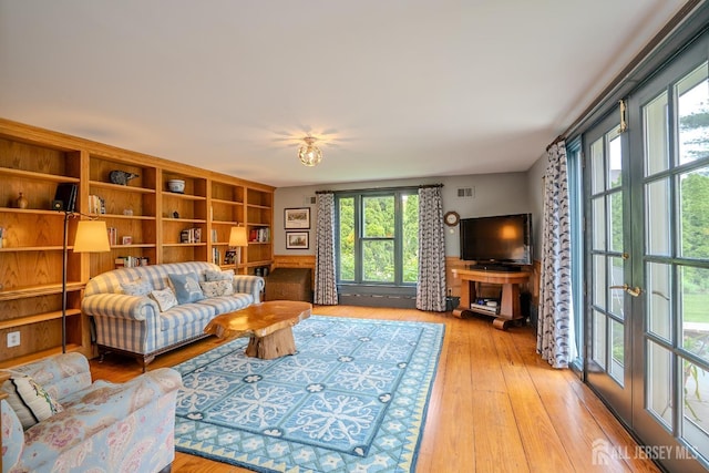 7 Finch Ct, West Windsor, NJ 08550 - living area with plenty of natural light and light wood-style flooring
