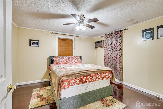115 W Woodbridge Ave W, Iselin, NJ 08830 - bedroom featuring wood finished floors, a wall mounted air conditioner, ornamental molding, a textured ceiling, and ceiling fan