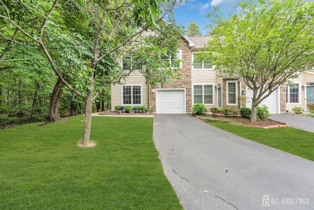 22 Daffodil Way, Old Bridge, NJ 08857 - view of front of property with driveway, stone siding, and a front yard