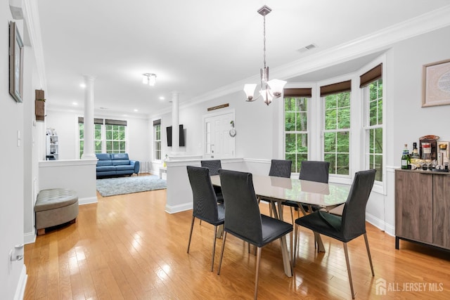 22 Daffodil Way, Old Bridge, NJ 08857 - dining room featuring ornate columns, light wood-style floors, crown molding, a chandelier, and recessed lighting