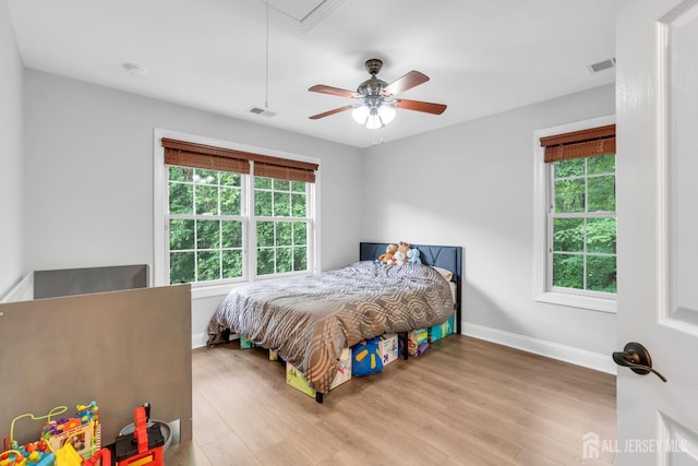 22 Daffodil Way, Old Bridge, NJ 08857 - bedroom with wood finished floors, multiple windows, and ceiling fan