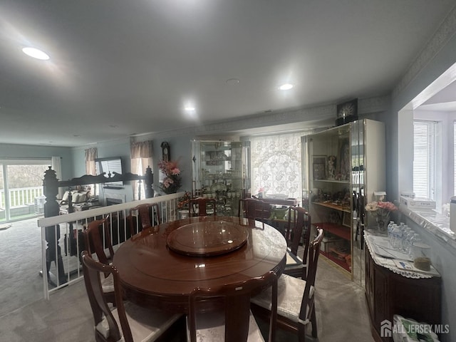 dining area featuring recessed lighting
