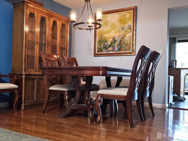 857 Jamestown Rd, East Windsor, NJ 08520 - dining room with a chandelier and wood finished floors