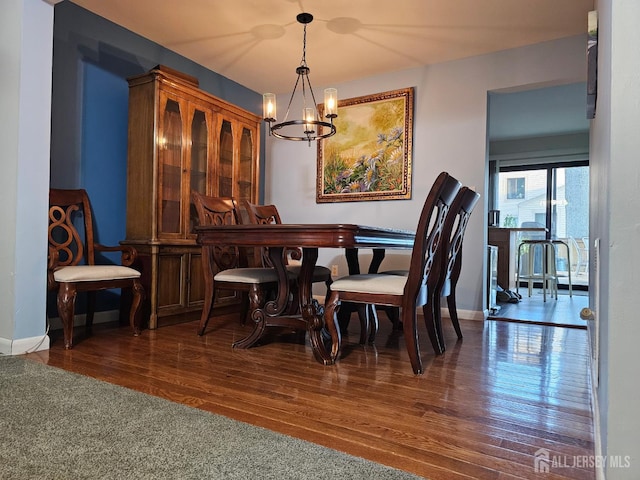 857 Jamestown Rd, East Windsor, NJ 08520 - dining room with a chandelier and wood finished floors