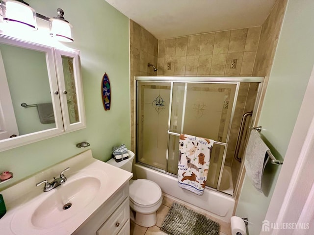 857 Jamestown Rd, East Windsor, NJ 08520 - full bath featuring vanity, shower / bath combination with glass door, and tile patterned flooring