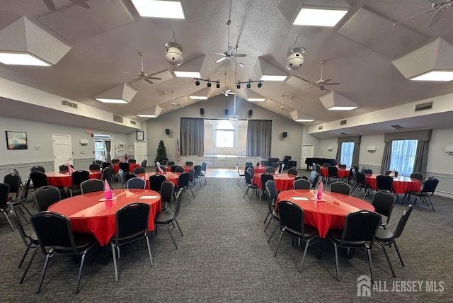 518 Petunia Ln N, Whiting, NJ 08759 - carpeted dining space featuring lofted ceiling and wainscoting