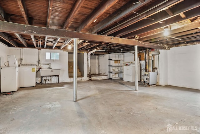 58 Fern St, Edison, NJ 08817 - below grade area with washer and clothes dryer and a sink