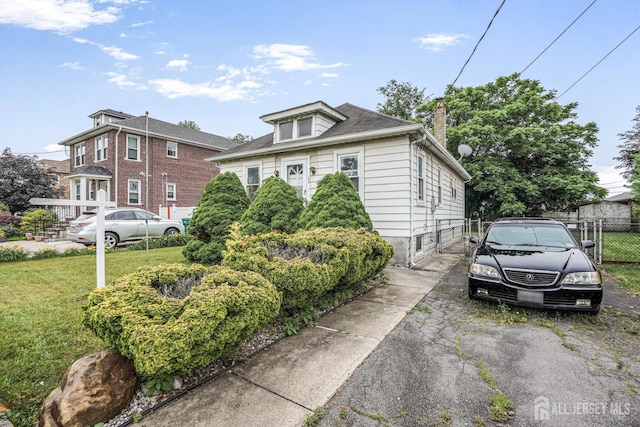 58 Fern St, Edison, NJ 08817 - view of front of house with a chimney