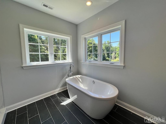 bathroom featuring a bath