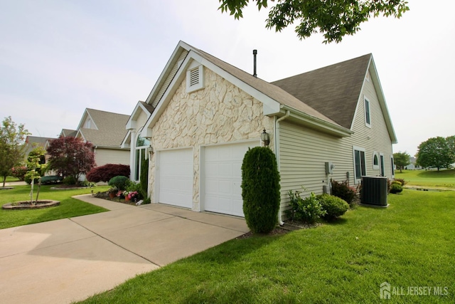 124 Chichester Rd, Monroe, NJ 08831 - view of side of home featuring stone siding, an attached garage, central air condition unit, driveway, and a yard