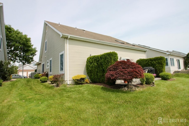 124 Chichester Rd, Monroe, NJ 08831 - view of property exterior with a yard and central AC unit