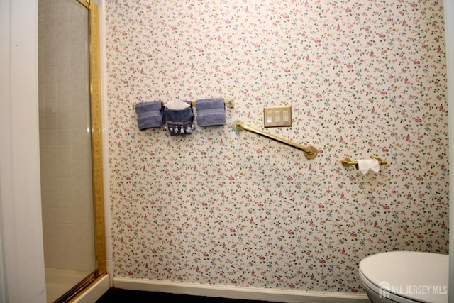 124 Chichester Rd, Monroe, NJ 08831 - full bath with wallpapered walls, baseboards, a shower stall, and toilet