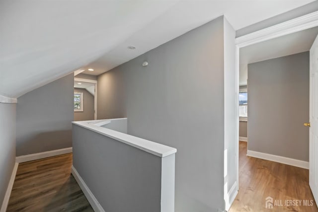 48 Columbus Ave, Edison, NJ 07008 - hallway featuring an upstairs landing, wood finished floors, baseboards, recessed lighting, and vaulted ceiling
