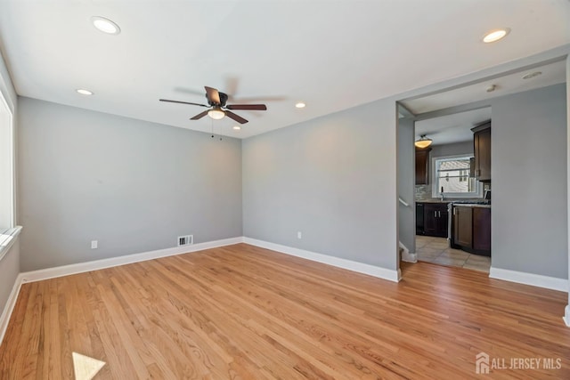 48 Columbus Ave, Edison, NJ 07008 - spare room featuring a ceiling fan, light wood-style flooring, recessed lighting, and baseboards