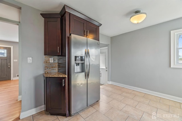 48 Columbus Ave, Edison, NJ 07008 - kitchen featuring stainless steel refrigerator with ice dispenser, tasteful backsplash, baseboards, and plenty of natural light