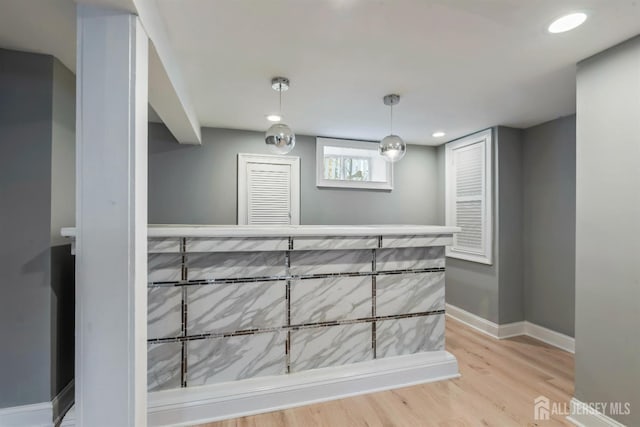 48 Columbus Ave, Edison, NJ 07008 - bar area with wood finished floors, baseboards, hanging light fixtures, and recessed lighting