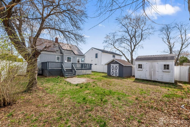 48 Columbus Ave, Edison, NJ 07008 - view of yard with a shed, a wooden deck, and an outbuilding
