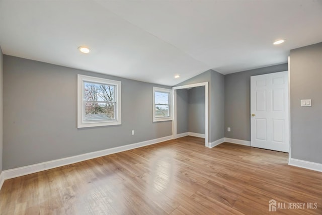 48 Columbus Ave, Edison, NJ 07008 - unfurnished bedroom with vaulted ceiling, baseboards, light wood-style floors, a closet, and recessed lighting