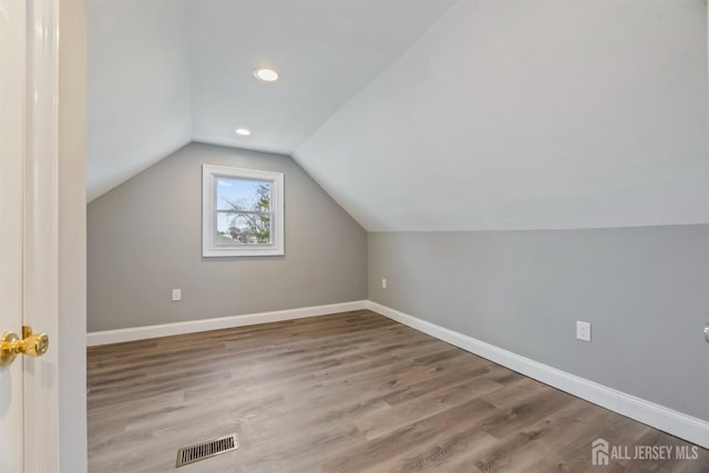 48 Columbus Ave, Edison, NJ 07008 - bonus room featuring vaulted ceiling, baseboards, wood finished floors, and recessed lighting