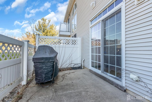 view of patio with fence