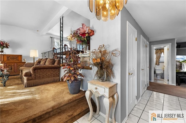 interior space featuring beam ceiling and an inviting chandelier