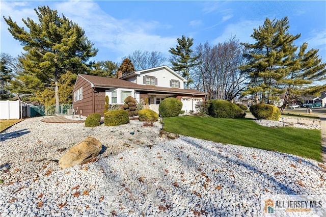 view of front property with a front yard