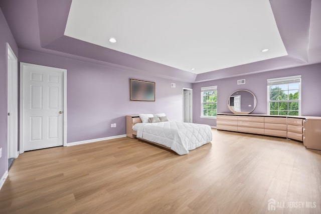 1004 Antoinette Dr, Monroe, NJ 08831 - bedroom featuring a raised ceiling, light wood-style floors, and recessed lighting