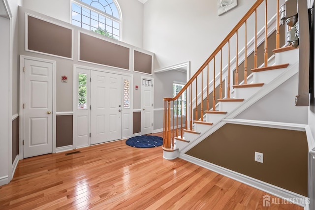 1004 Antoinette Dr, Monroe, NJ 08831 - entryway with wood finished floors, a towering ceiling, and stairway