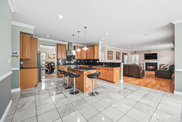 1004 Antoinette Dr, Monroe, NJ 08831 - kitchen with wall chimney range hood, open floor plan, dark countertops, granite tiled floors, and appliances with stainless steel finishes