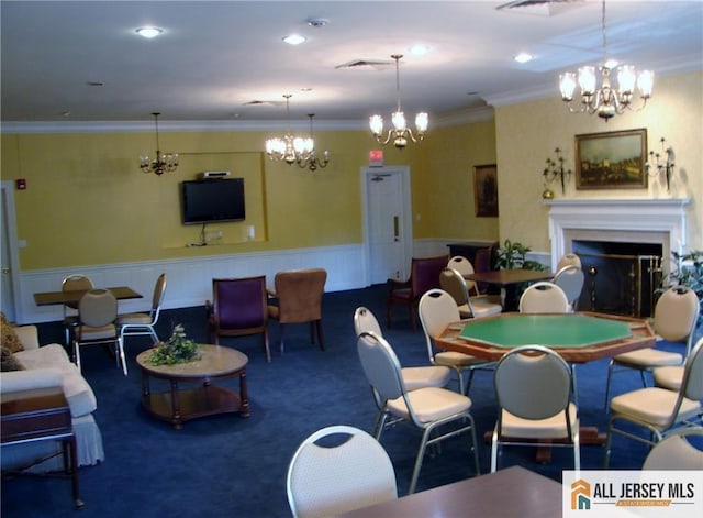 156 Pelham Ln Unit 156N, Monroe, NJ 08831 - game room featuring a chandelier, carpet flooring, wainscoting, a fireplace, and ornamental molding