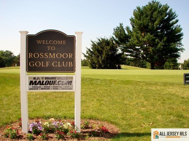 156 Pelham Ln Unit 156N, Monroe, NJ 08831 - community / neighborhood sign with a lawn and golf course view