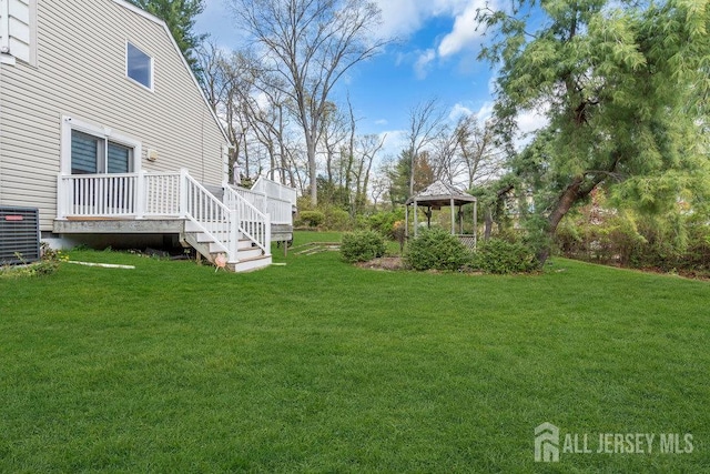 17 Thomas Rd, East Brunswick, NJ 08816 - view of green lawn with a gazebo and a wooden deck