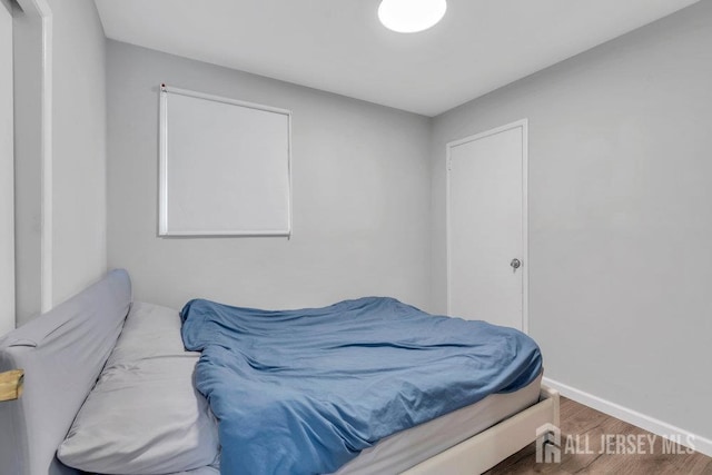 17 Thomas Rd, East Brunswick, NJ 08816 - bedroom with wood finished floors and baseboards
