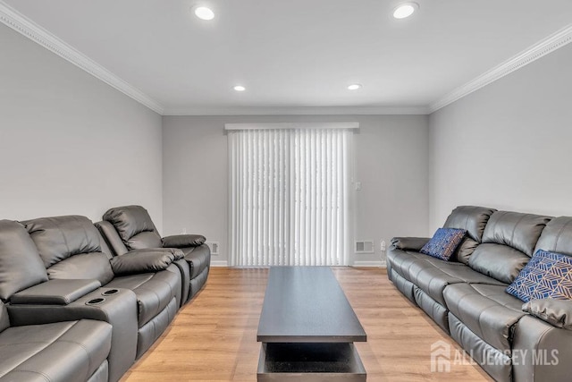 17 Thomas Rd, East Brunswick, NJ 08816 - living area featuring crown molding, recessed lighting, and light wood finished floors