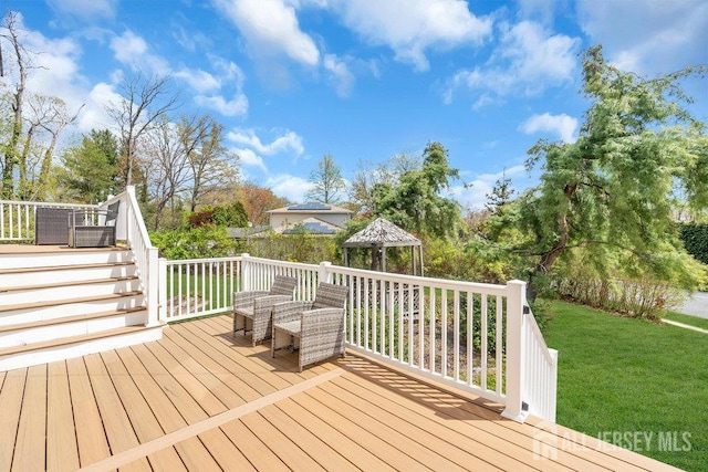 17 Thomas Rd, East Brunswick, NJ 08816 - deck featuring a yard, a gazebo, and stairway