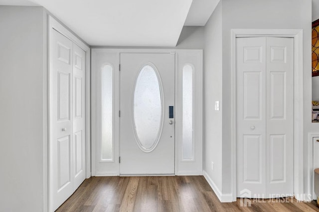 17 Thomas Rd, East Brunswick, NJ 08816 - entryway with wood finished floors and baseboards