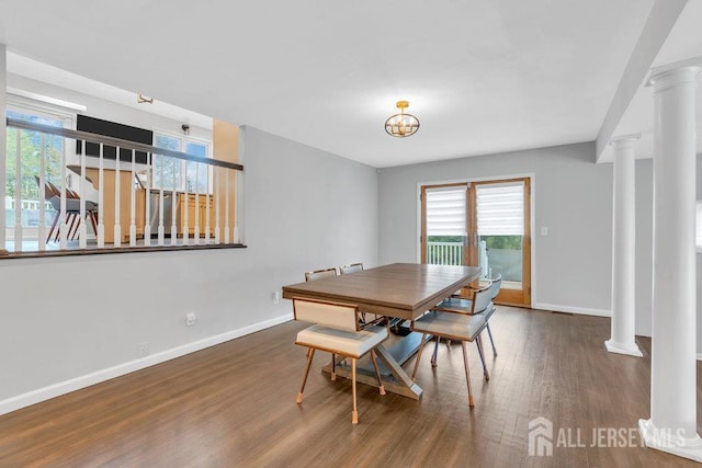 17 Thomas Rd, East Brunswick, NJ 08816 - dining room with ornate columns, wood finished floors, and healthy amount of natural light