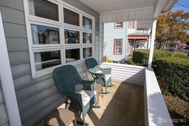 view of patio featuring a porch